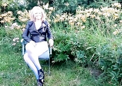 A Aged Woman Is Wearing Sheer Tights Outside.
