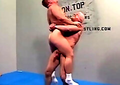 Brett Akers takes on John Mangoss in a steamy wrestling match