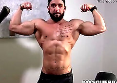Bearded guy Zack Lemec shows off his muscles during jerk off