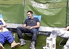 Young men relax while camping and masturbate in a group