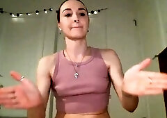 Lovely small titted brunette fingering her pussy