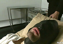 Transgender scientist fucks man in gimp mask