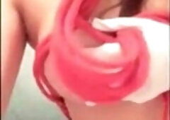 A gorgeous Asian woman with large breasts performs a sexy striptease on her webcam, teasing and seducing the audience with her stunning Chinese beauty