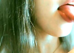 Just a cute and wicked hotty sucking lollipops, begging dad to cum on her throat . Throat close up