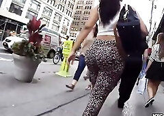 This wicked voyeur captures the hot and moist bubble ass on this glamorous gal walking down the crowded streets in candid footage outdoors