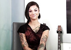 Tattooed brunette hair with indecent mind, Bonnie Rotten is rubbing her twat during the time that having anal sex