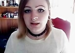 Sexy t-girl with piercings shows her small tits