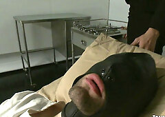 Tranny scientist fucks man in gimp mask