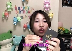 Adorable Japanese sex shop assistant showcases latest Japanese condoms during a wild fuck party