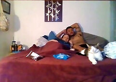 Pair smokin' and cuddling