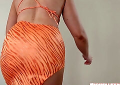 Blonde strips through her lingerie and dress collection with flashing upskirt views