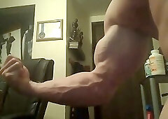Hot Bodybuilder Flexing Posing and Bending A Bar
