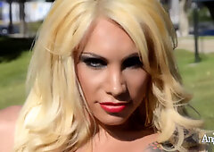 Public modeling in a blue dress