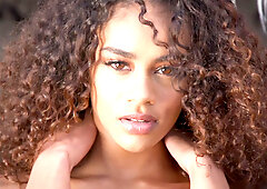 Ebony model babe Scarlit Scandal in a super hot striptease for Playboy