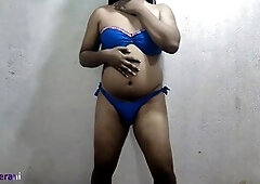 Shruteerani shows off in a blue swimsuit while crossdressing as a big-busted shemale