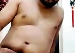 Indian man in hot red outfit