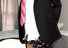 Cuffed Ballgagged and Suit Unwrapped