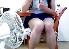 A seductive college bitch plays alone inserting cucumber, bottle, and a syringe of egg into her