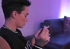 Tattooed lesbians enjoy pussyeating session on the couch