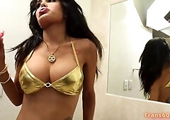 Karla Carrillo giving a behind-the-scenes look at her life as a tattooed brunette latina trans