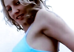 A colourful photo series showing Lady Margaux in a taut bikini in front of a blue background to ballsy her shapes and girl.