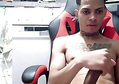 young dude using a masturbator on live geyser.