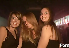 College girls dance in fishnets at a wild public party