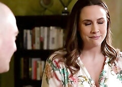 Gazing at his body, she is clearly becoming aroused and bites her lip lustfully as she rubs her pussy over her clothes a little.