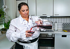 Huge breasted mature whore playing with her beaver in the kitchen