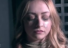 Tied up sexy chick Jacey Jinx gets her pussy and anus stretched in the dark room