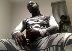 Kinky guy enjoying solo play with a big black toy