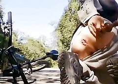Young Man on a Bike with a Butt Plug