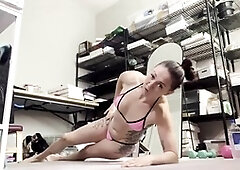 Solo brunette hottie unwinds in the bathroom after sports