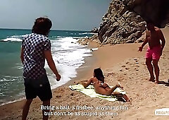 Handsome guy is having sex with Noe Milk on the beach, in the middle of the day