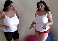 Busty babe playing with her big boobs