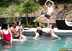 Beautiful busty dolls Krissy Lynn and Dana DeArmond share a big cock