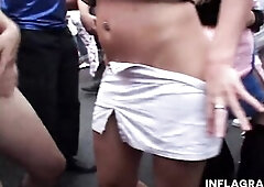 Tempting blond playgirl in pink underware Sharon Da Vale dancing erotically in the public crowd