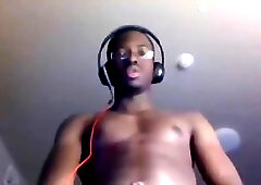 Sexy black boy jerks on his big cock