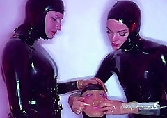 Pitiful slave humiliated and punished in BDSM latex threeway