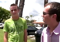 Guy drops his pants for a blowjob in a garage