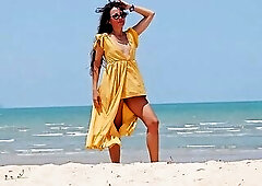 No Brassiere No Pants on Publilc Beach # Red Ass Plug below Yellow costume