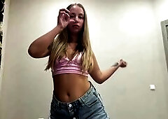 Tattooed Blonde Teases in Pink Top