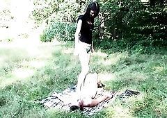 At a picnic in a meadow think of Lady Morgana, that babe wishes to watch her serf suffer somewhat. Lying on the blanket this guy get to serve her as t