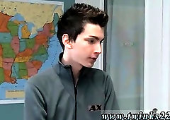 Teacher is sitting at his desk looking so good