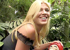 enthralling blonde shemale strips outdoors and shows big culo