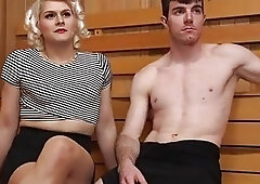 Bulky blonde ladyboy Isabella barebacks a dude in the sauna