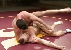 Muscled Bad Boys Settle Things In The Wrestling Arena