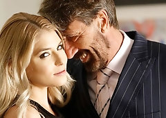 Gorgeous blonde Nikki Peach looks nice in the doggy style pose