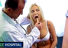 Busty Blonde Needs Help in the Doctors Toilet -
