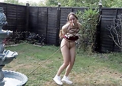 Serf Mila hasn’t kept up with her exercise routine, so u drag her to the garden fountain and binds her to it like a slothful pet. White All-Star sne